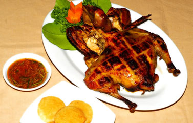 Thưởng thức gà bản Đôn nướng sả